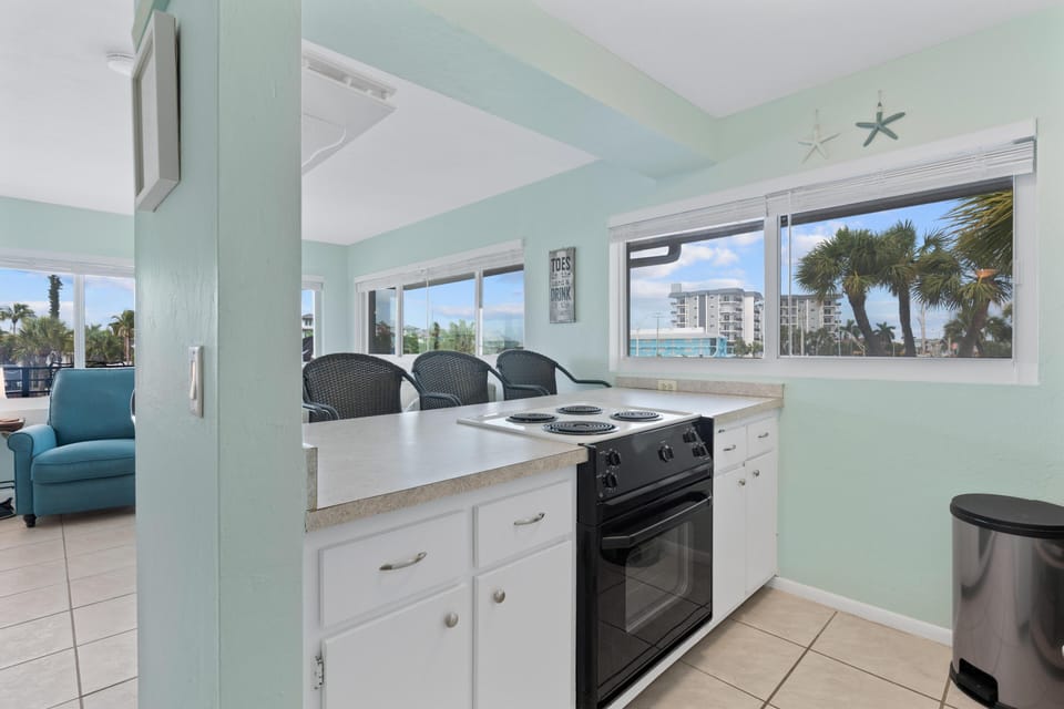 Condo, 1 King Bed with Sofa bed (Crescent Shore 201) | Private kitchen | Oven, toaster