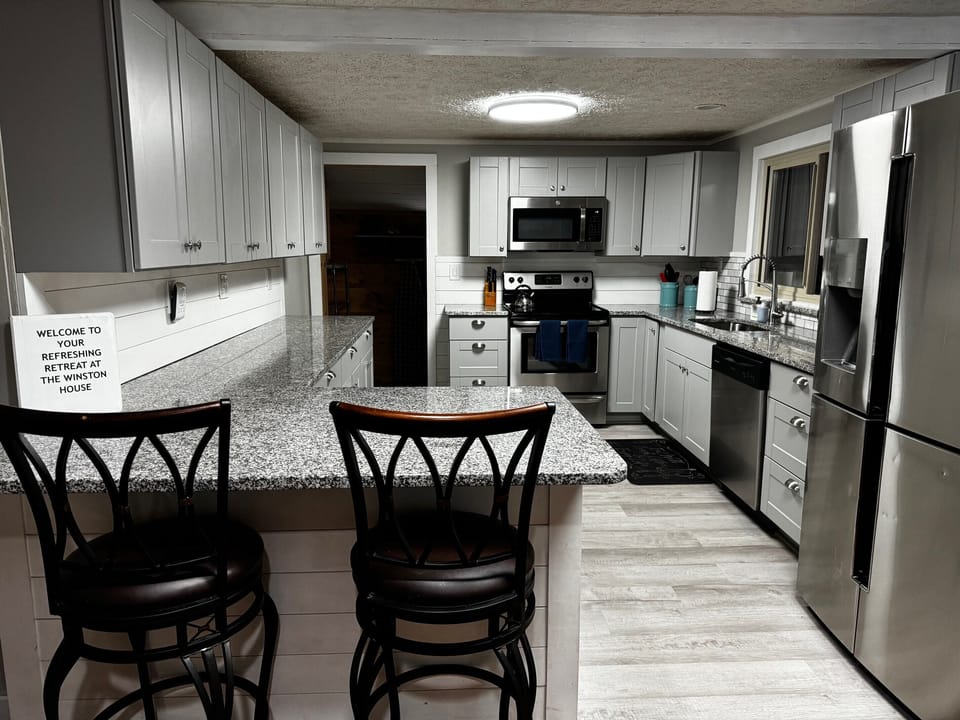 Full kitchen is equipped with everything you need to make a home cooked meal