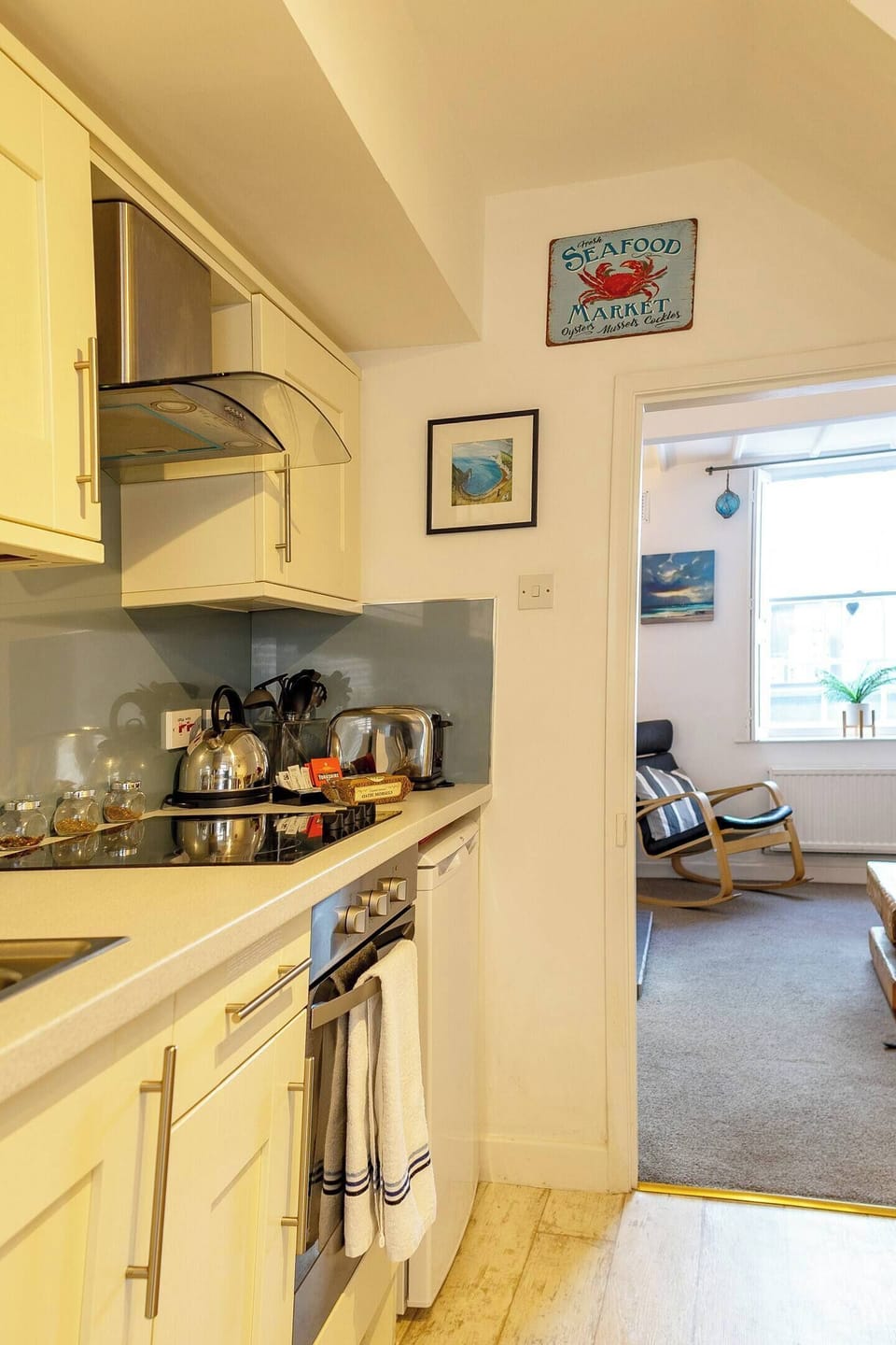 A stylish, fully equipped kitchen with modern appliances—perfect for home-cooked meals or casual dining.