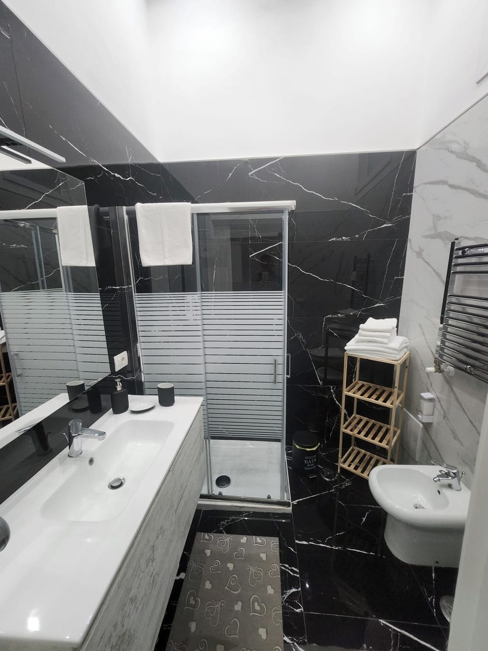 Standard Triple Room, Balcony, City View | Bathroom | Separate tub and shower, hair dryer, bidet, towels