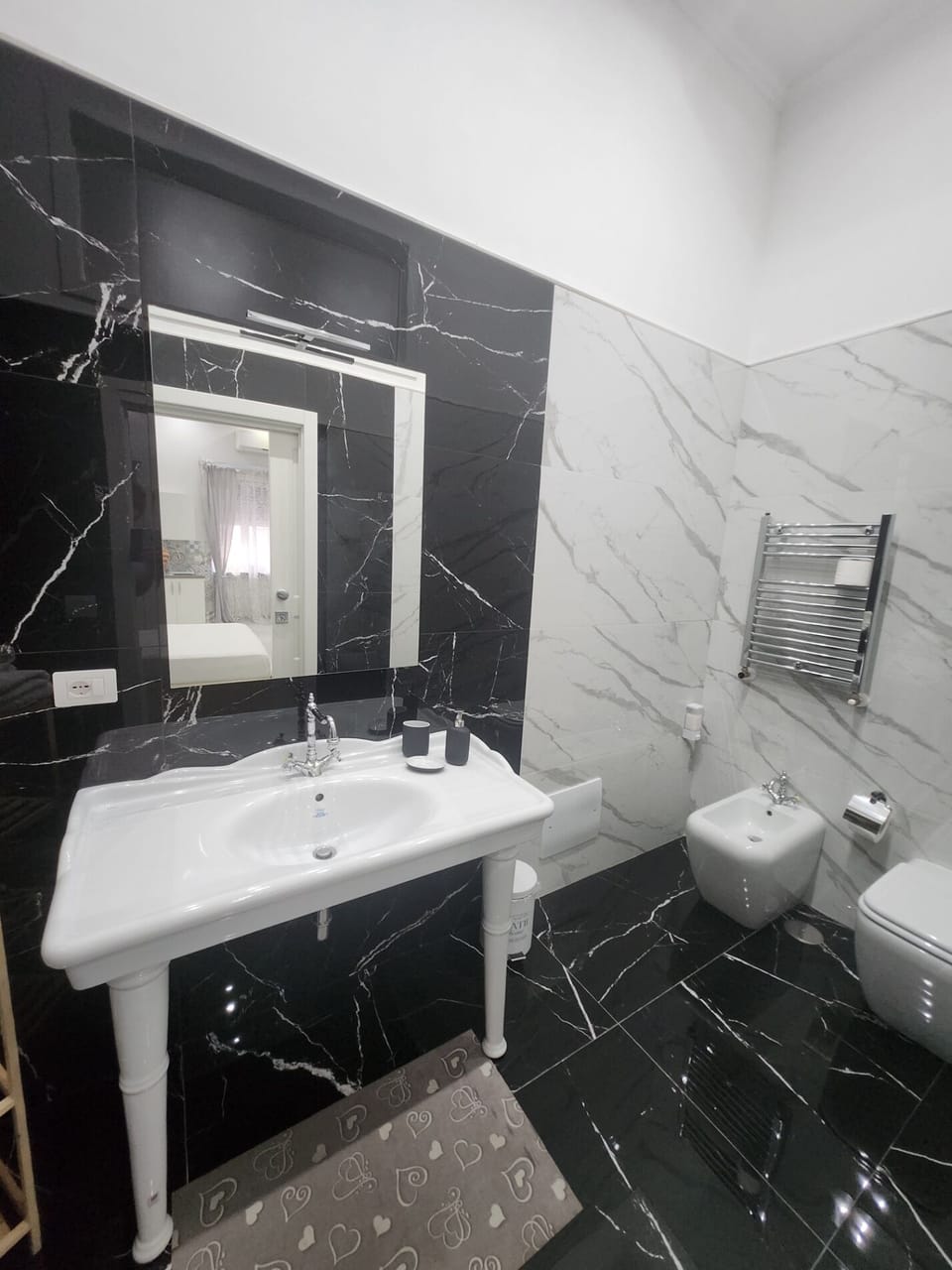 Superior Suite, Balcony, City View | Bathroom | Separate tub and shower, hair dryer, bidet, towels