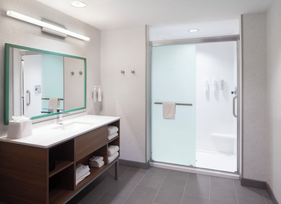 Hair dryer, towels, soap, shampoo