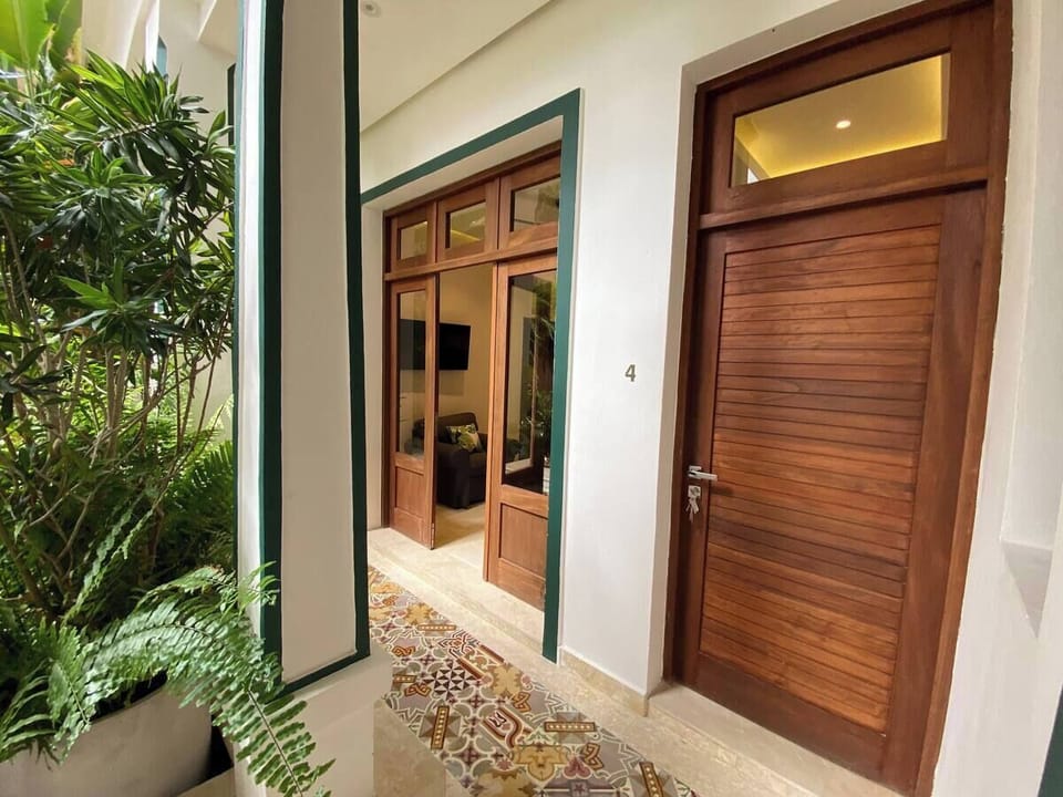 Superior Suite, Patio, Pool View | 1 bedroom, in-room safe, iron/ironing board, free WiFi