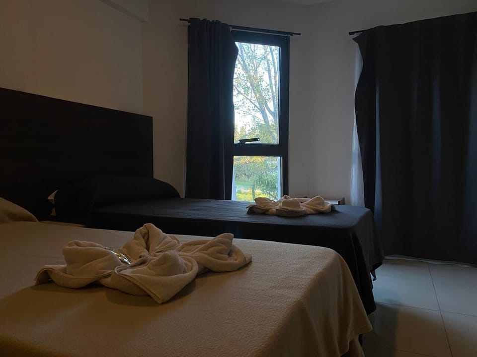Desk, laptop workspace, free WiFi, bed sheets