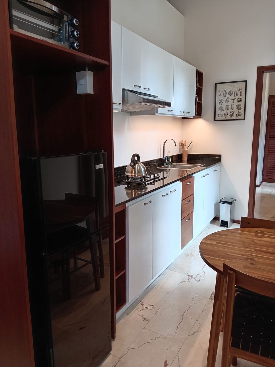 Superior Suite, Kitchen, Pool View | Private kitchen