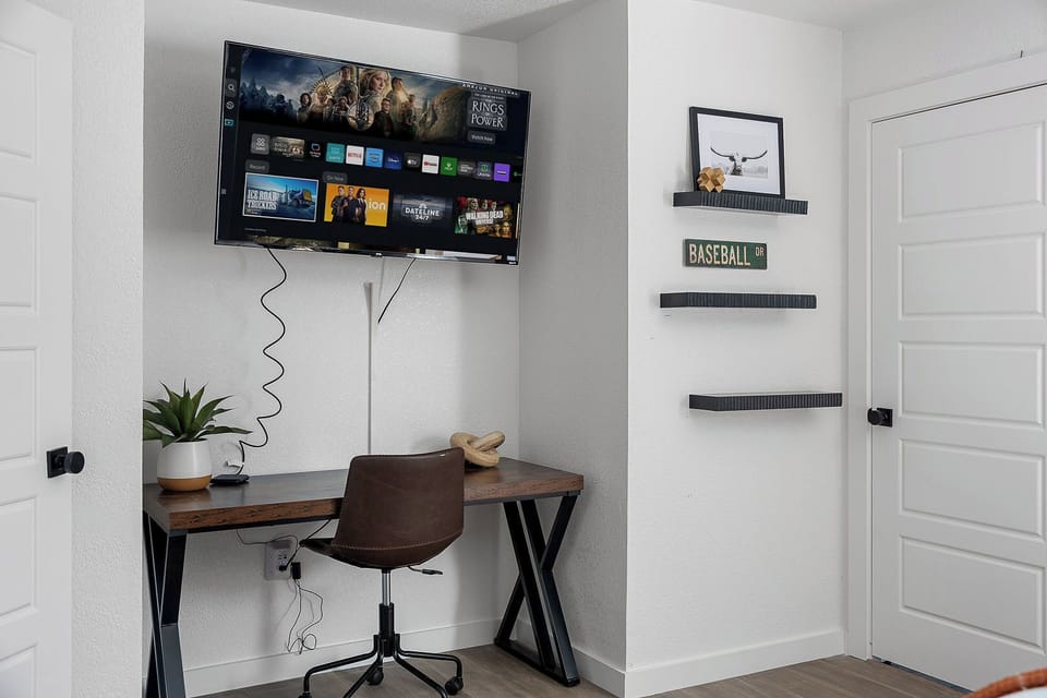 Smart TV and stylish workspace nook for work or relaxing