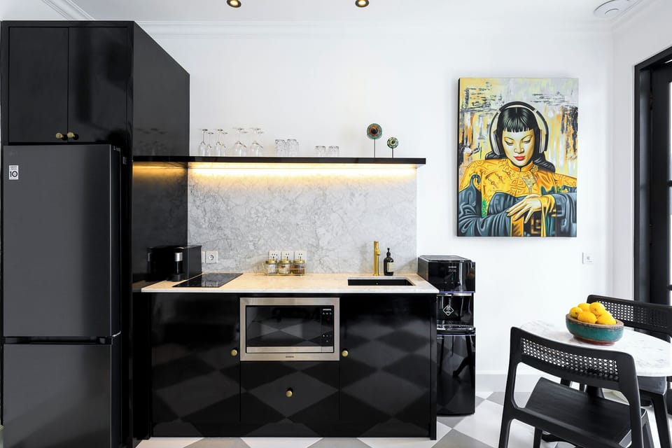 Villa | Private kitchen | Coffee/tea maker, electric kettle, cleaning supplies, dining tables