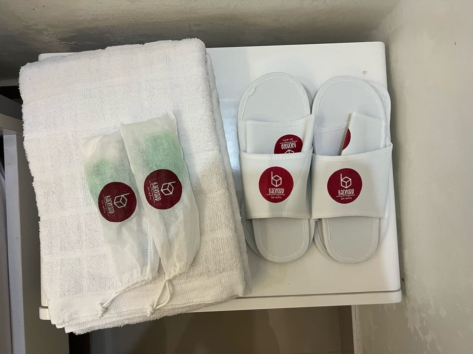 Shower, slippers, bidet, towels