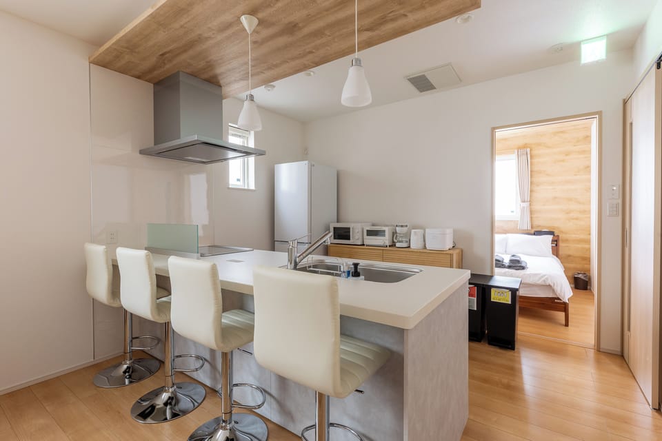 Full-size fridge, microwave, stovetop, electric kettle