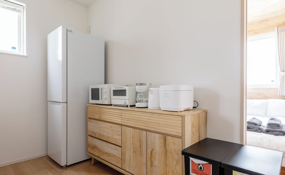Full-size fridge, microwave, stovetop, electric kettle