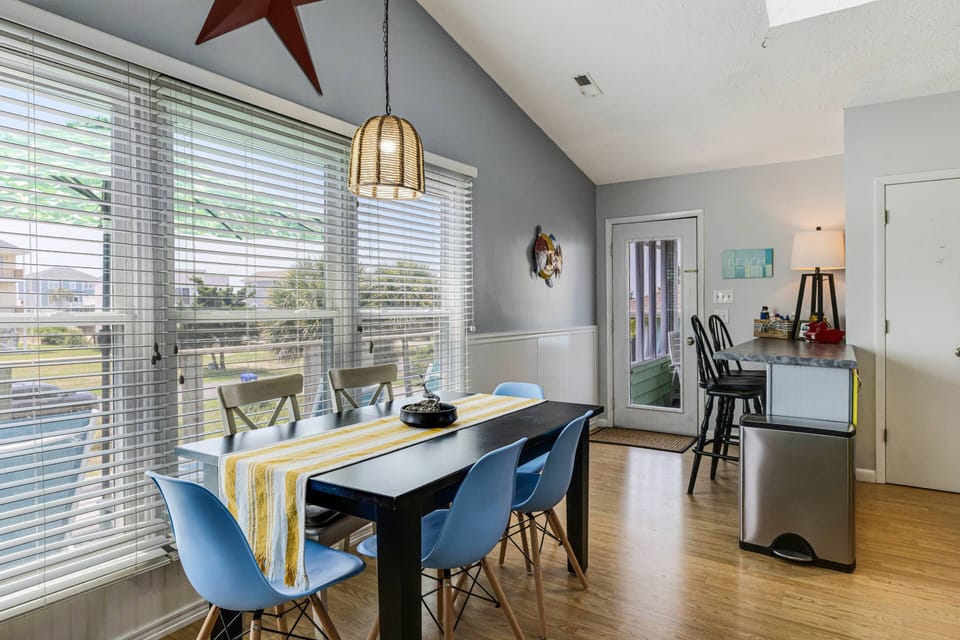 Dining table for 6 Just off the Kitchen along with a bar and 2 stools