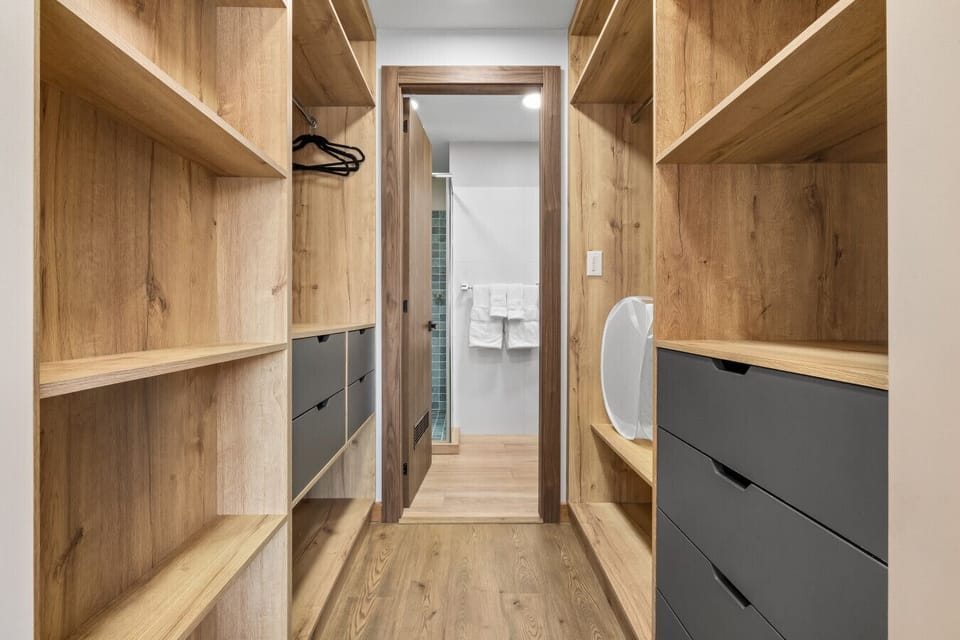 Here’s the walk-in closet in the master bedroom. Plenty of space for all your things, plus it keeps everything organized and within reach!