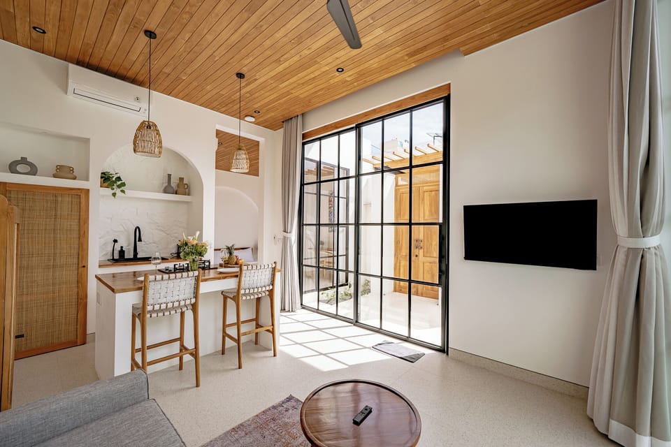 Deluxe Villa, Patio, Pool View | Living area | 46-inch flat-screen TV with digital channels, Netflix