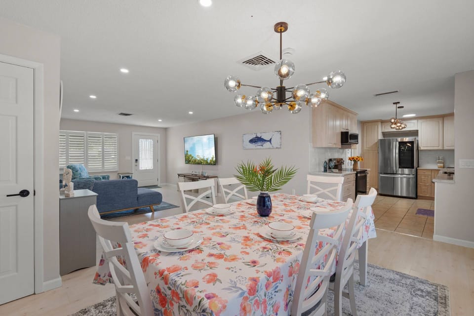Gather for meals in the open dining area, just steps from the kitchen and living space.