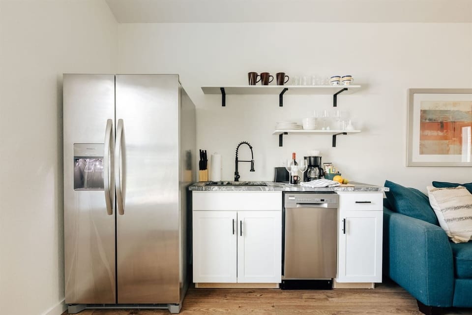 Enjoy a seamless stay with a completely equipped kitchen..