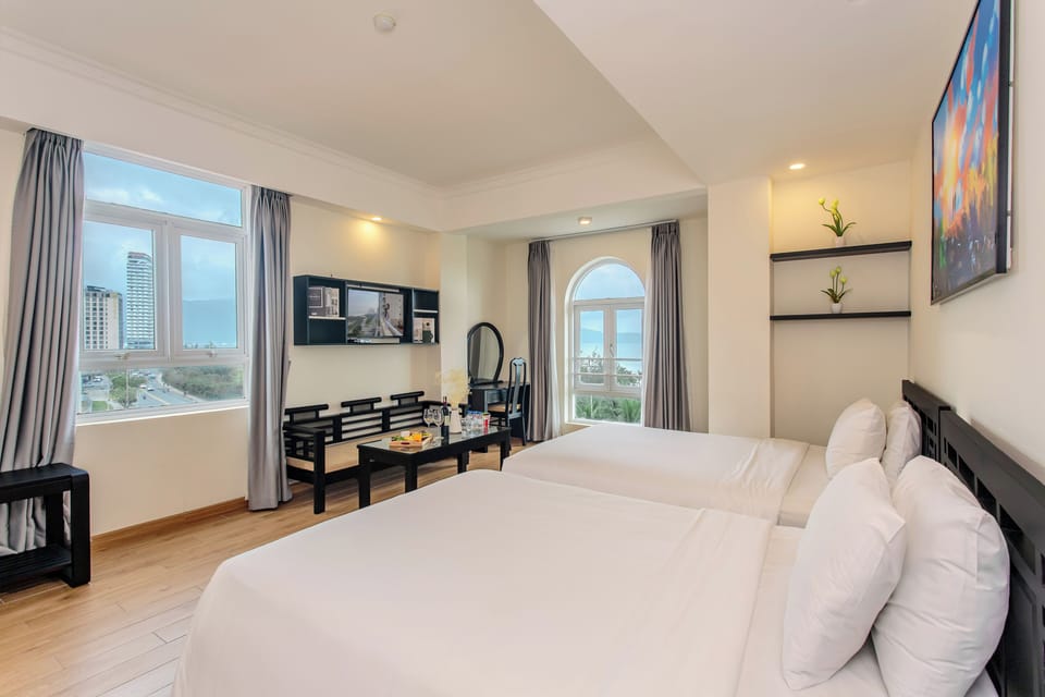 Family Suite, Sea View | In-room safe, desk, laptop workspace, blackout drapes