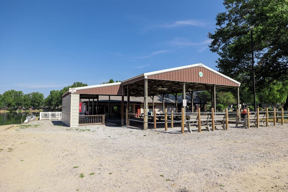 Enjoy the camp store and nearby picnic area with tables, perfect for casual outdoor dining.