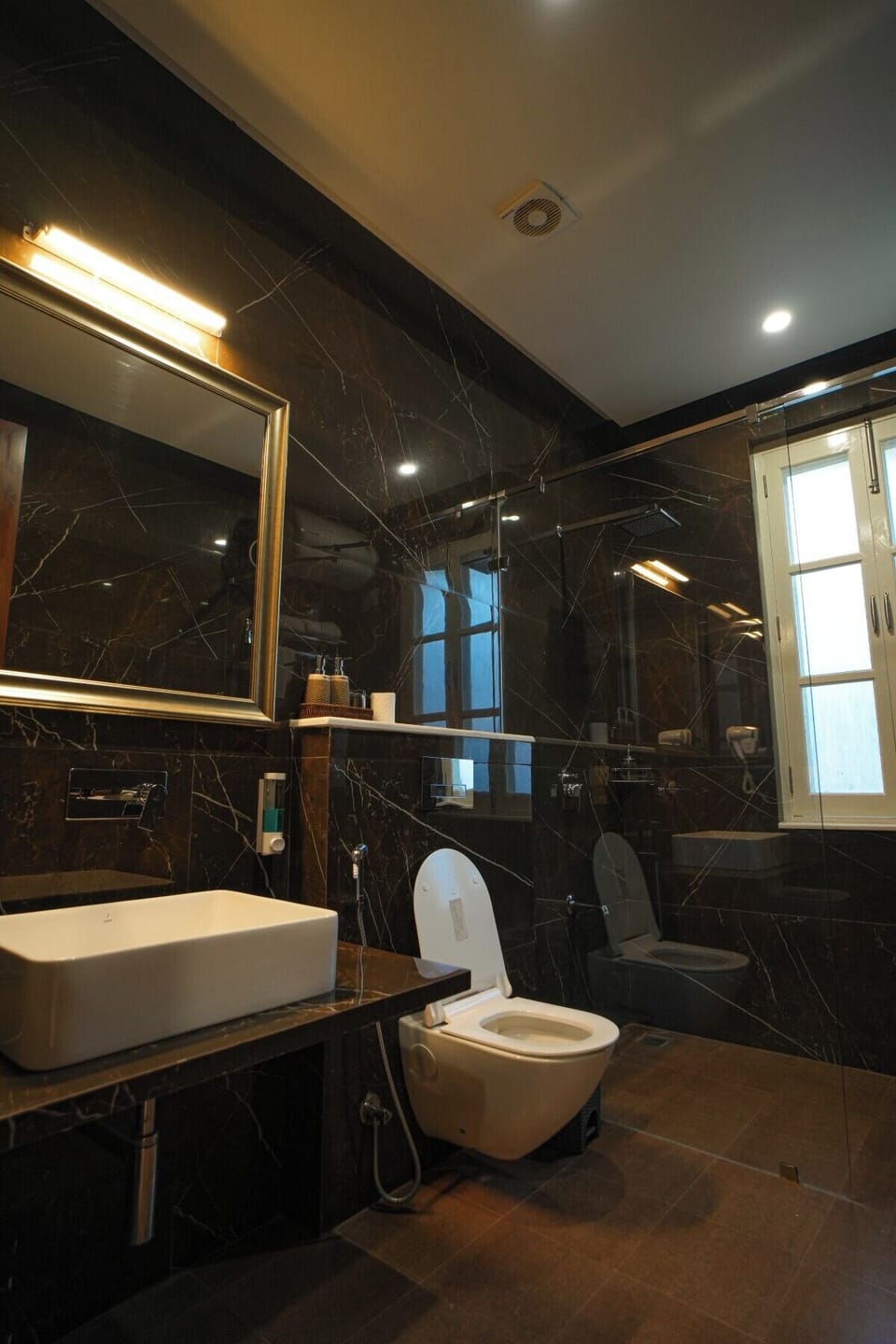 Shower, free toiletries, hair dryer, slippers