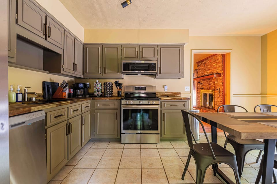 Enjoy a spacious dining room with seating for everyone — ideal for relaxing evenings after a day near Fort Moore, GA!