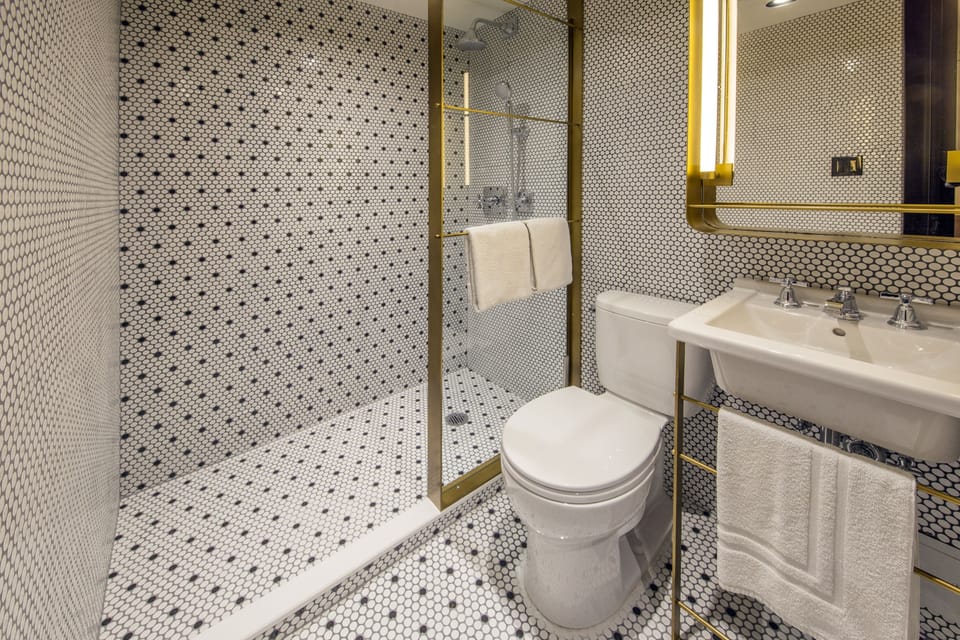 Rainfall showerhead, designer toiletries