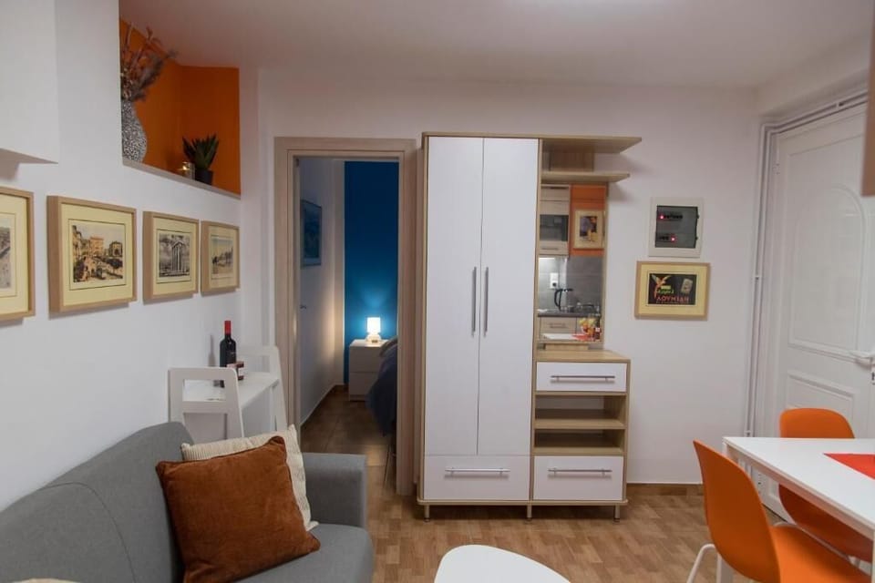 Economy Apartment, 1 Bedroom, Kitchenette | Living area | 43-inch flat-screen TV with digital channels