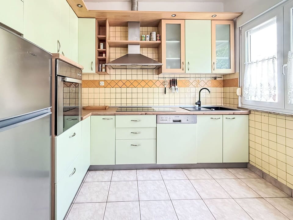 Kitchen, Kitchen Appliance, Cabinetry, Major Appliance, Flooring, Countertop, Interior Design, Floor, Sink, Home Appliance