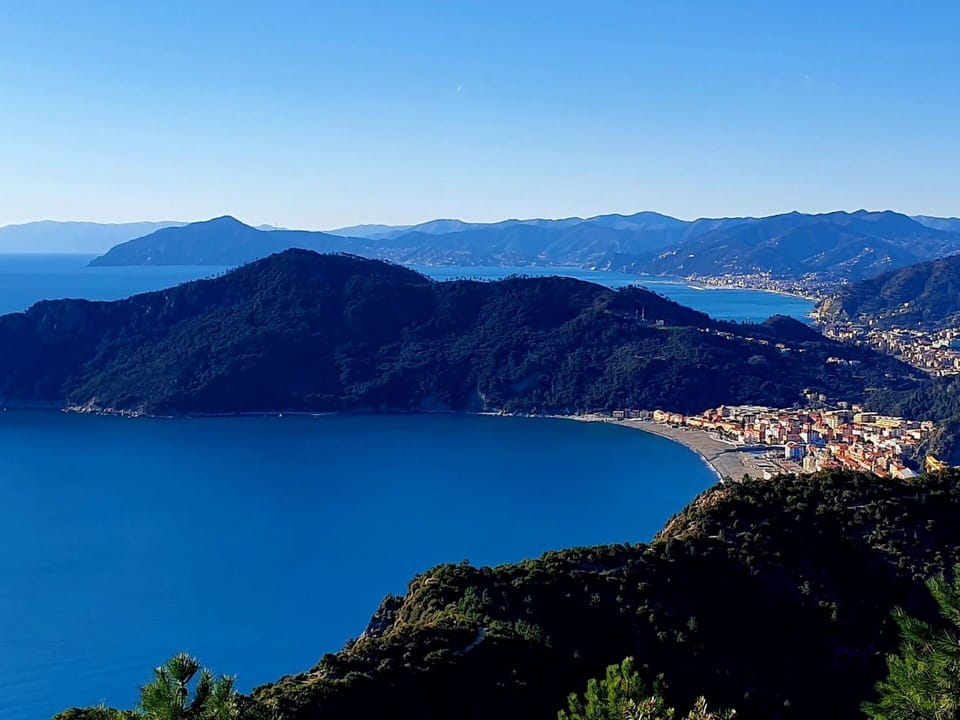 Mountain, Blue, Mountainous Landforms, Water, Water Resources, Body Of Water, Hill, Natural Landscape, Horizon, Coast
