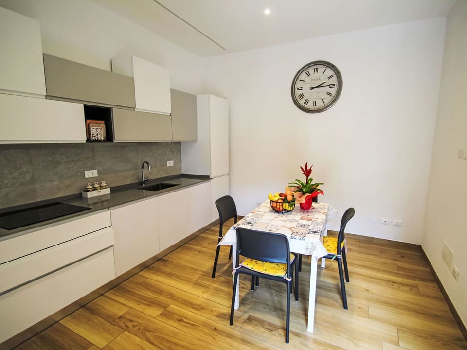 Furniture, Interior Design, Flooring, Floor, Wood, Kitchen, Countertop, Room, Cabinetry, Wood Flooring