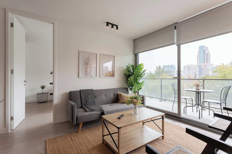 Enjoy a stylish retreat with stunning city views, modern furnishings, and a cozy outdoor seating area perfect for relaxation.