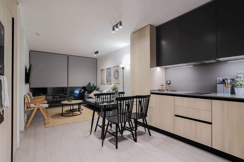 Experience modern comfort in this stylish open-plan living area, perfect for relaxing and entertaining.