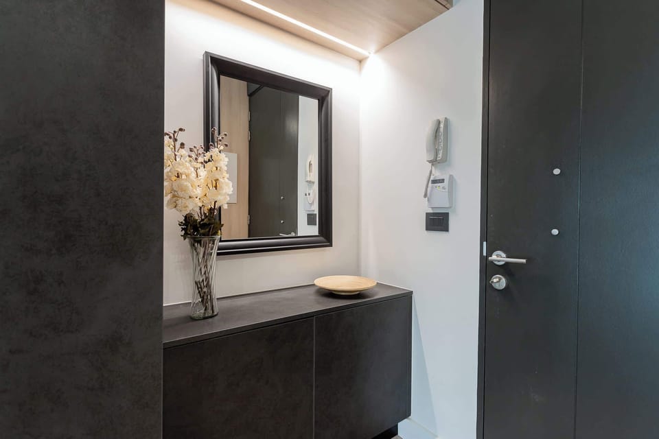Step into a stylish entrance with modern decor and a welcoming atmosphere, setting the tone for your stay.