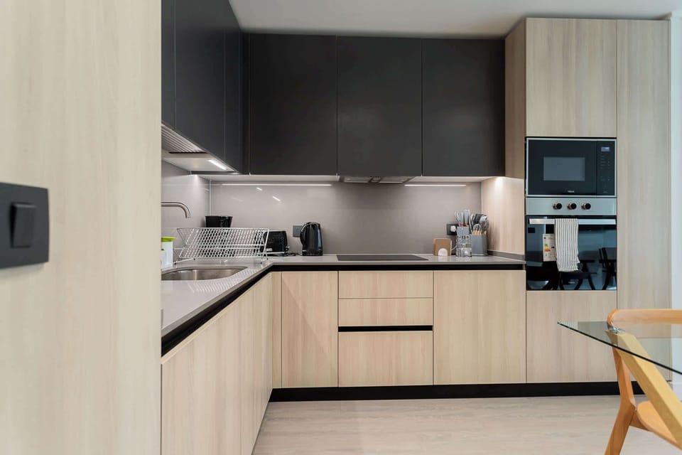 Cook in style in this sleek, modern kitchen with top-notch appliances and ample space for culinary creativity.
