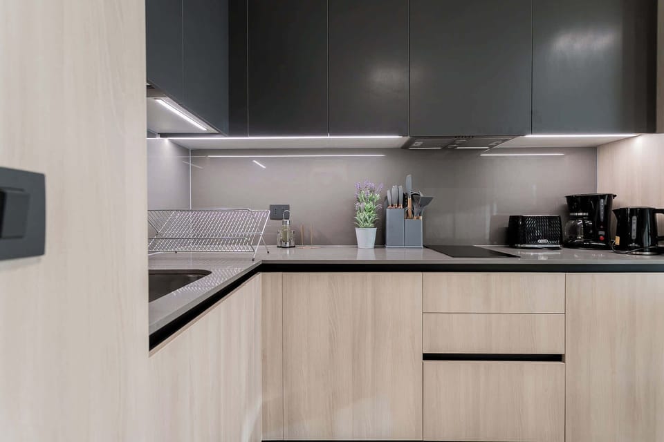 Sleek and modern kitchen with all essentials for a comfortable stay in the heart of Chile.