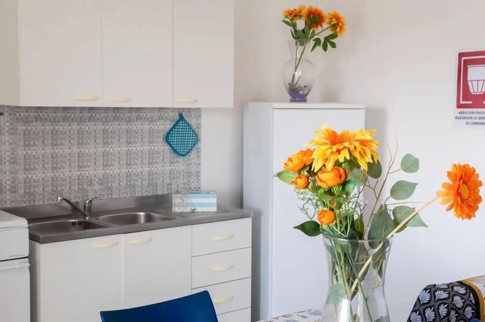 Apartment, Balcony, City View | Private kitchen | Fridge, oven, stovetop, cookware/dishes/utensils