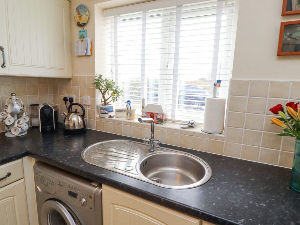 Fridge, microwave, cookware/dishes/utensils