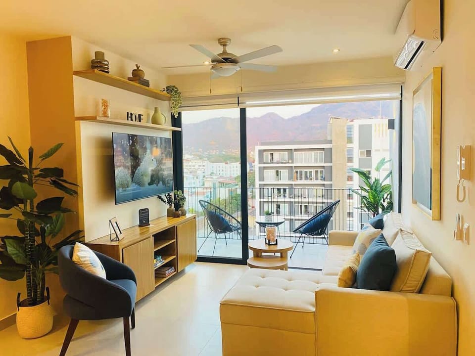Precious relaxing living area, with smart  58" TV & spectacular views