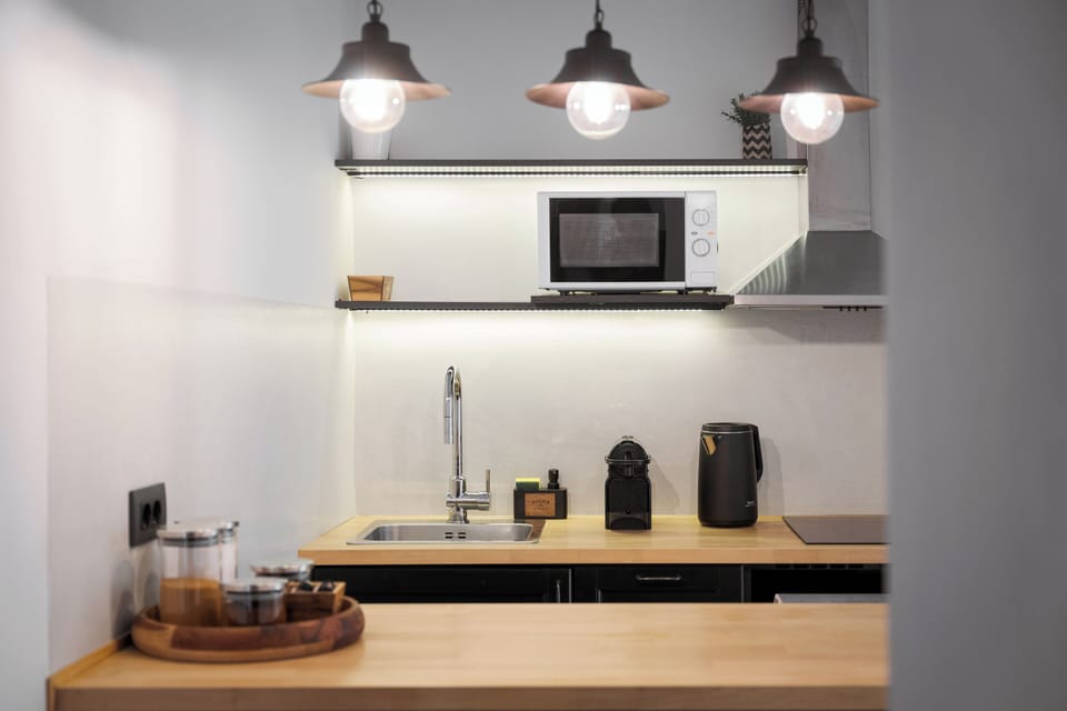 Apartment, Balcony | Private kitchen | Full-size fridge, microwave, oven, espresso maker