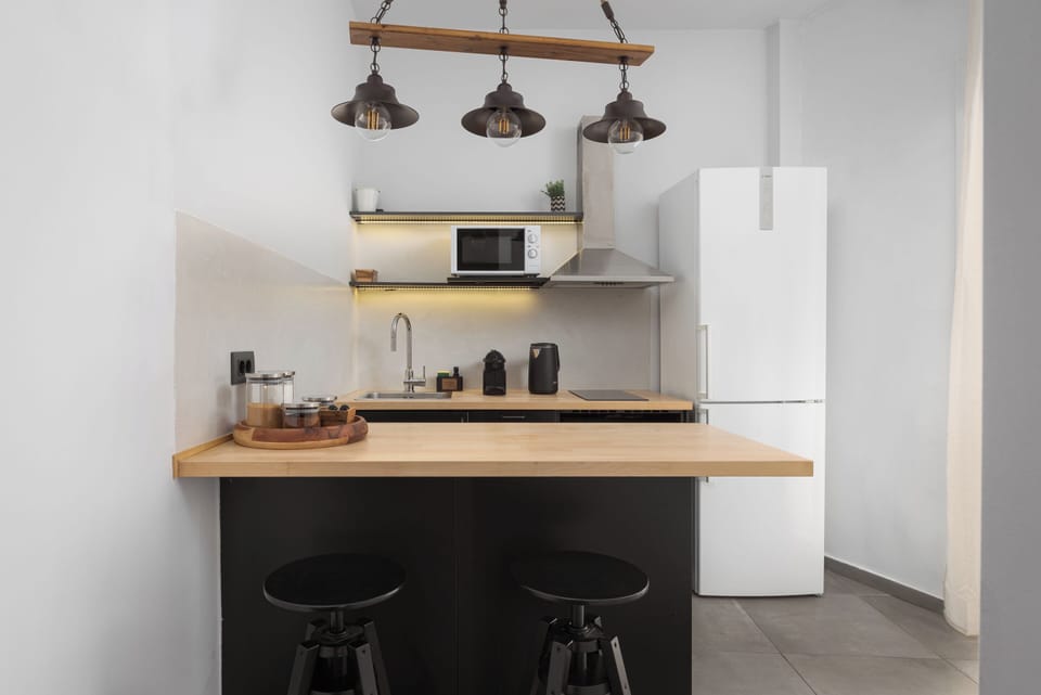 Apartment, Balcony | Private kitchen | Full-size fridge, microwave, oven, espresso maker