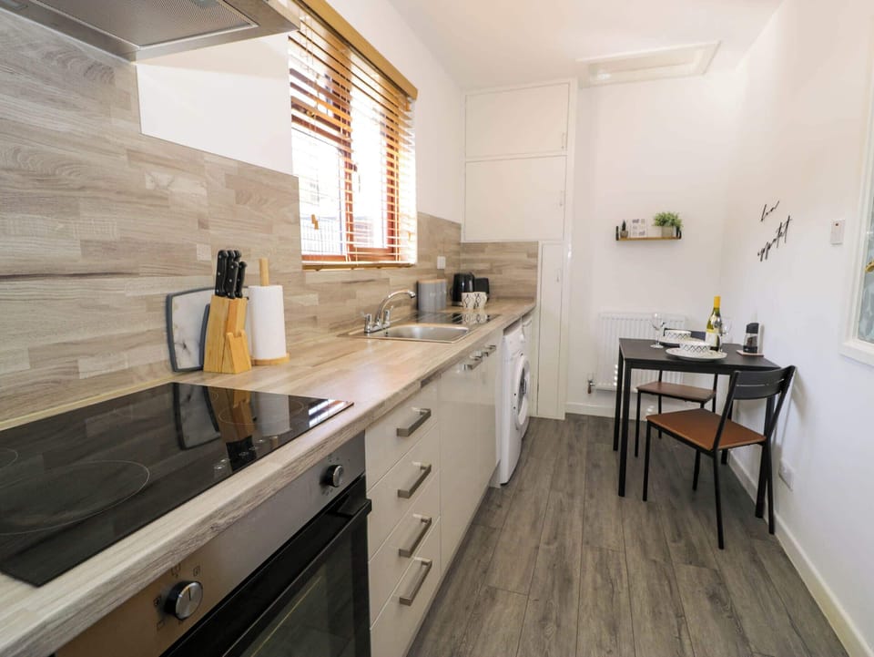 Fridge, microwave, toaster, cookware/dishes/utensils