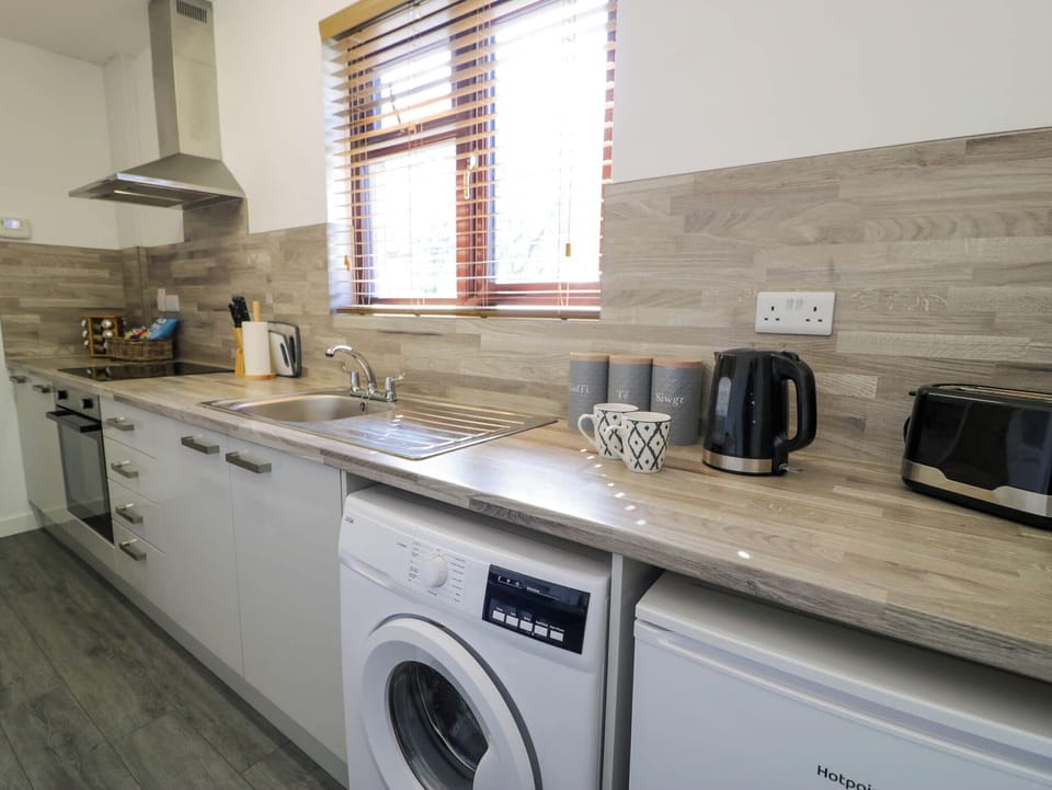 Fridge, microwave, toaster, cookware/dishes/utensils