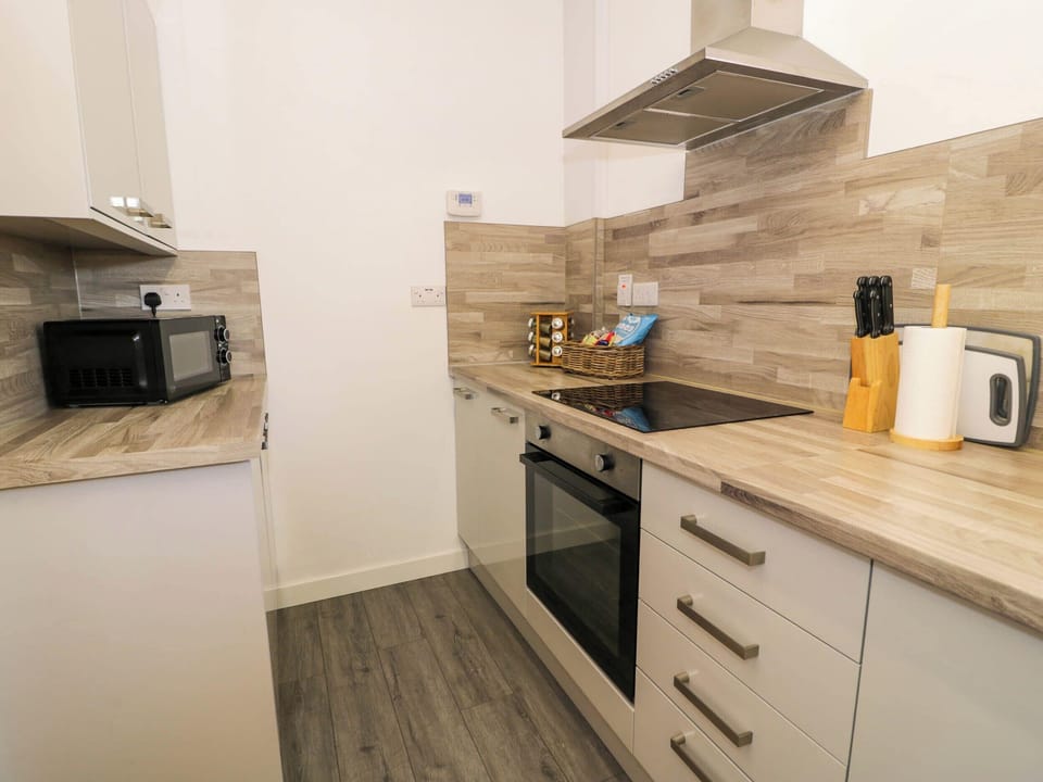Fridge, microwave, toaster, cookware/dishes/utensils