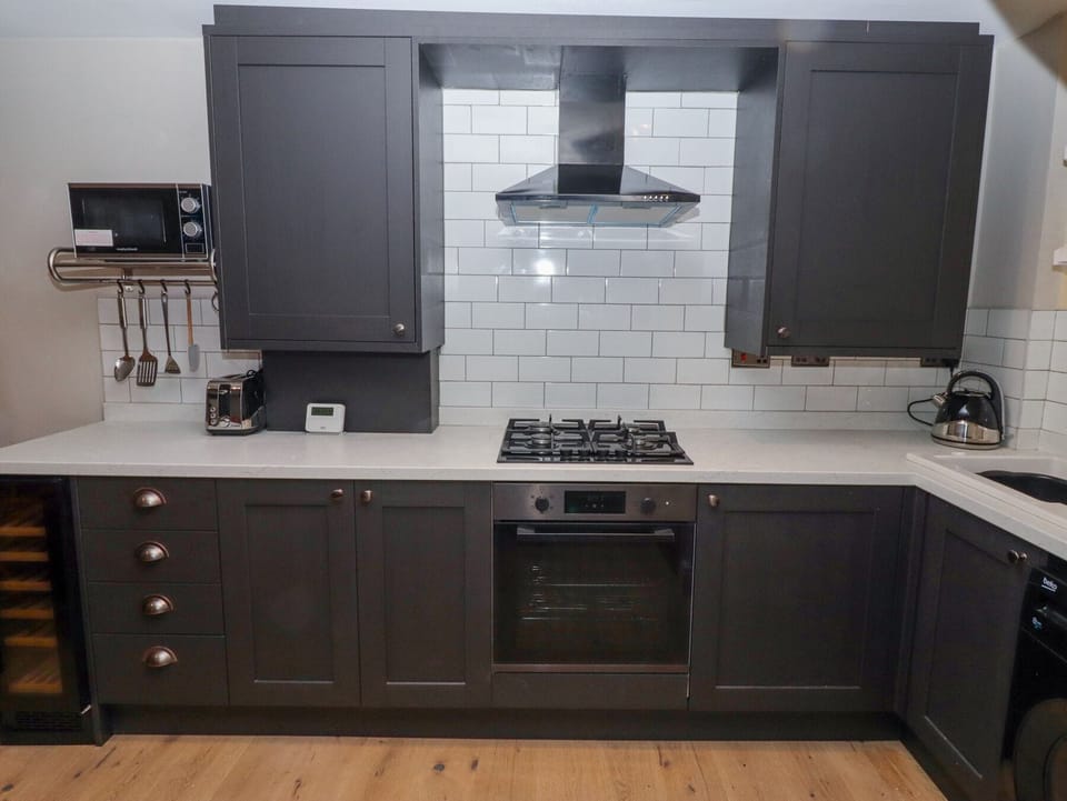 Fridge, microwave, cookware/dishes/utensils