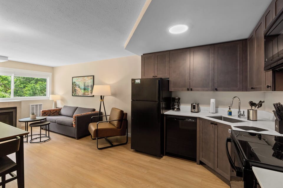 Condo, 1 Bedroom | Shared kitchen | Full-size fridge, microwave, stovetop, toaster