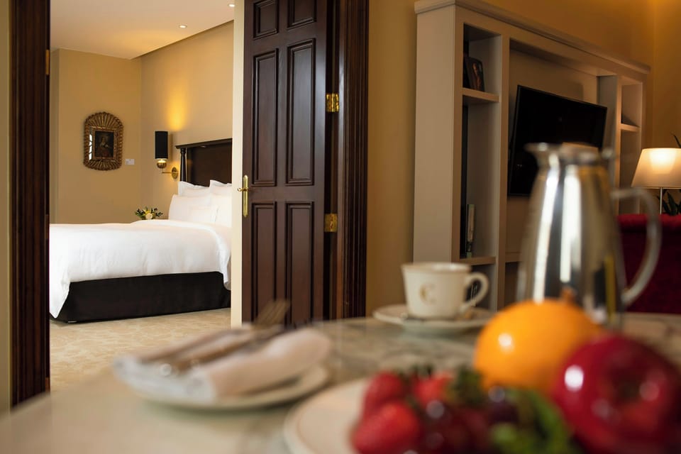 Premium bedding, down comforters, minibar, in-room safe