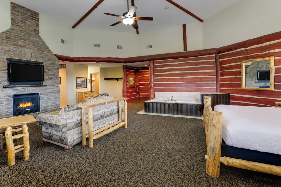 Theme Suite Mini Premier | Desk, laptop workspace, iron/ironing board, free cribs/infant beds