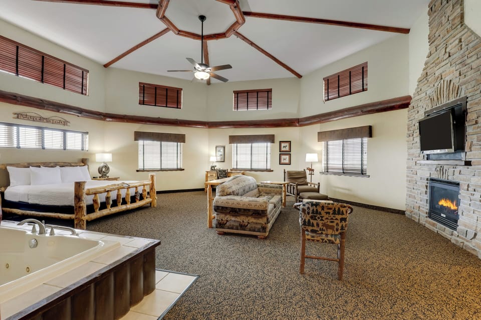 Theme Suite Mini Premier | Desk, laptop workspace, iron/ironing board, free cribs/infant beds