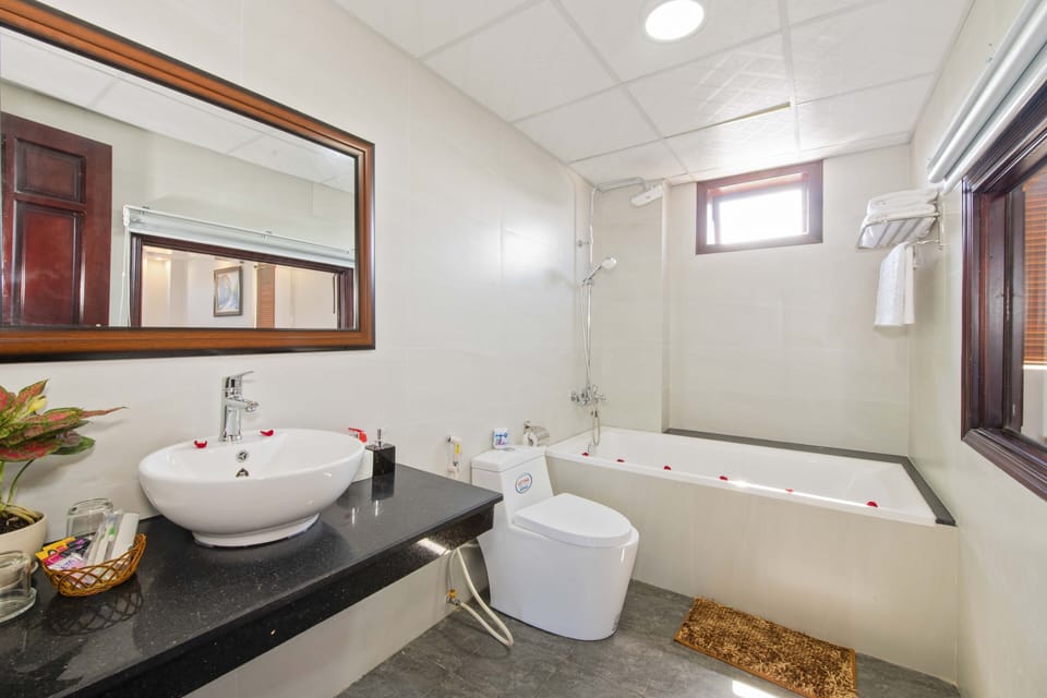 Shower, free toiletries, hair dryer, slippers
