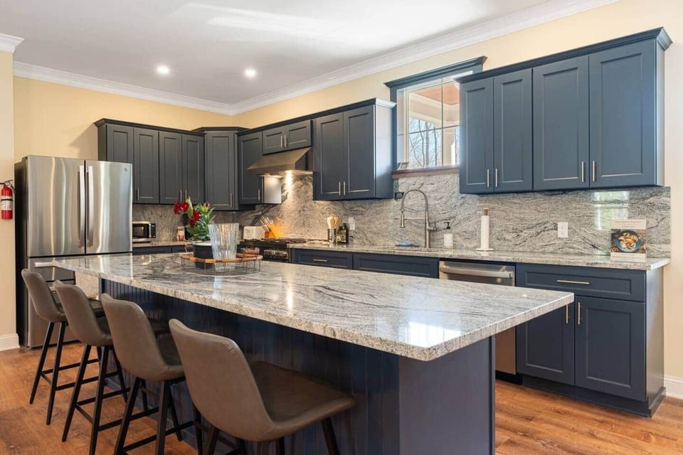 Brand new, fully stocked kitchen with gas stove and breakfast bar