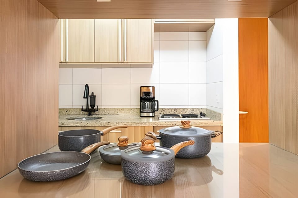 Apartment | Private kitchen | Fridge, microwave, stovetop, cookware/dishes/utensils