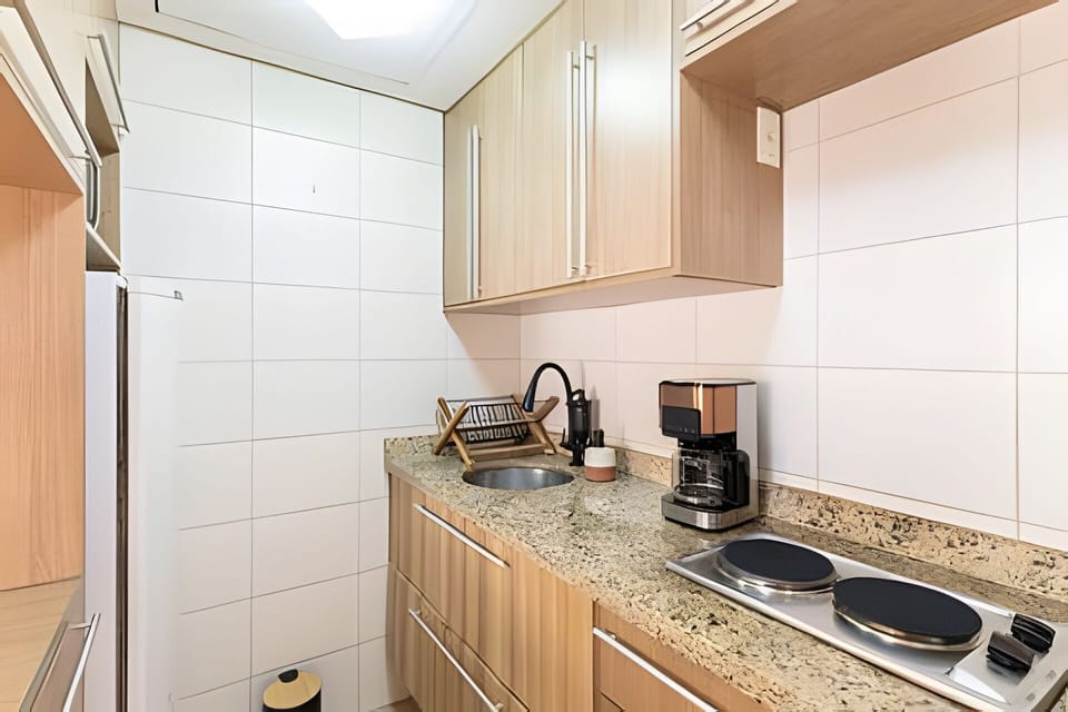 Apartment | Private kitchen | Fridge, microwave, stovetop, cookware/dishes/utensils